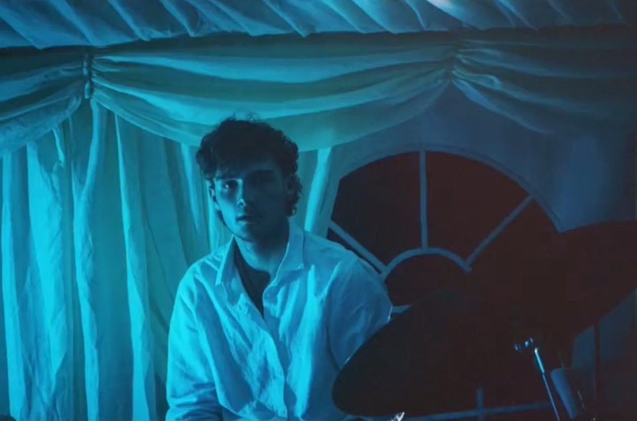 Driveblind band member performing with electronic instruments and indie setup